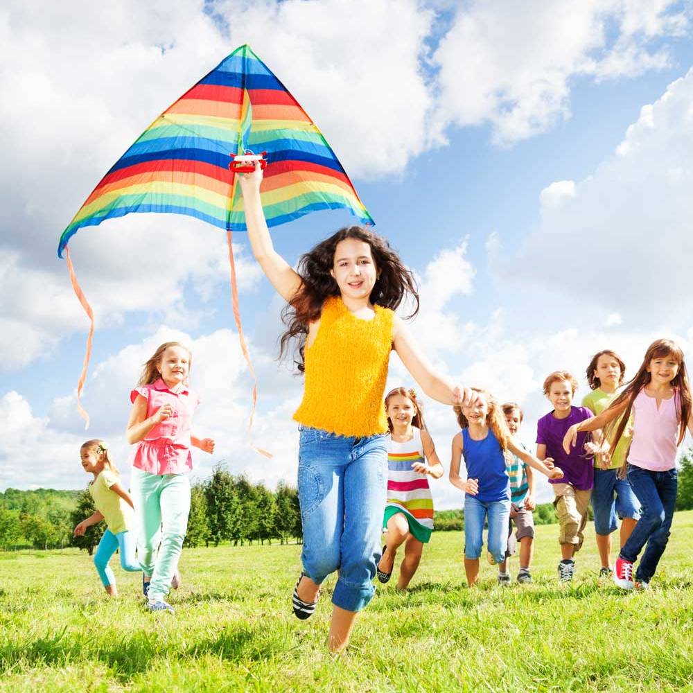 Girl playing with kite